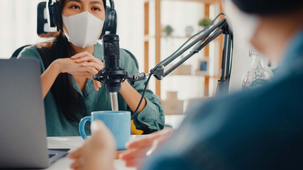 asia-girl-radio-host-record-podcast-use-microphone-WWTAFMJ.jpg